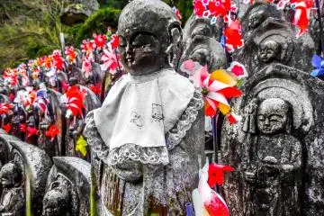 <p>Somewhat surprisingly, this is the first time I have seen these statues covered in white bibs as they are usually bright red in color</p>