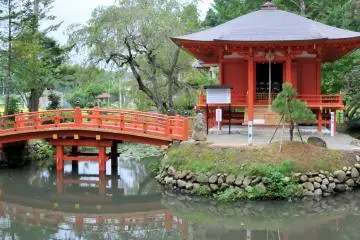 <p>A bridge over Gamagaike to the Benten-do, a small shrine dedicated to the Goddess Benzaiten - the only female member of Japan's seven lucky gods.</p>