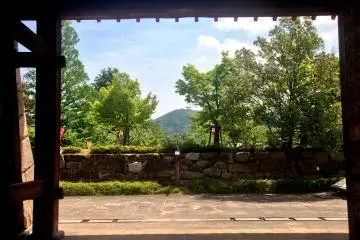 <p>The burrowed view of the distant mountains from the Maizuru Park Gardens</p>