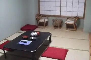 <p>My room seen from the door, with its little table and chairs by the window</p>
