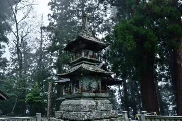 <p>A memorial standing in the mist</p>