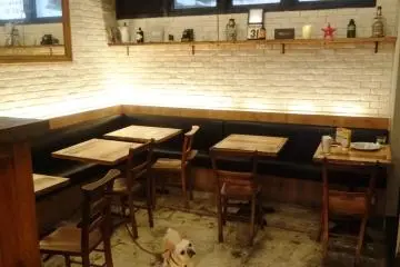 <p>The cozy back room of the restaurant</p>
