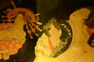 The painting on the wall is also known as "Shunga," a type of erotic ukiyo-e that developed in the Edo&nbsp;Period.