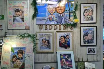 <p>I think a caricature placed in a message frame is a fun idea for weddings&nbsp;</p>