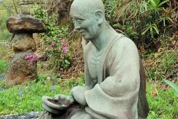 <p>When visiting a small temple or shrine that does not charge admission, it is always good to leave a small donation. This statue is looking for a donation too!</p>