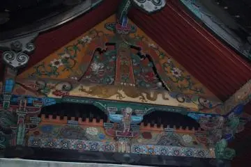 Detail work on the roof of the main building