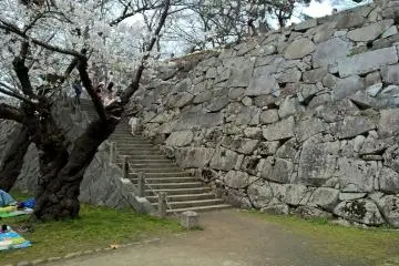 <p>The stairs leading to the top level, a good look at the granite wall</p>