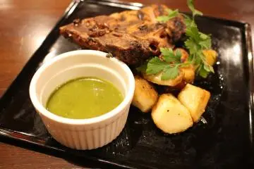 <p>Grilled pork with Mexican salsa verde</p>