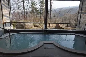 <p>Indoor bath with a view at Kagestu Highland Hotel</p>