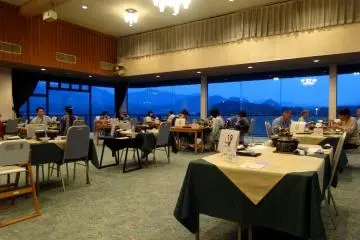<p>The dining room boasts lovely views of Hagi's sea and mountains</p>