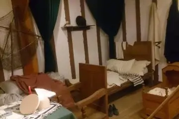 <p>A model of a pilgrim's home</p>