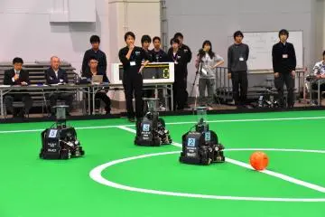 <p>Middle-sized robots of no more than 50cm diameter playing soccer to go to the World Robocup</p>