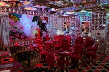 <p>More seating and art in the back corner</p>