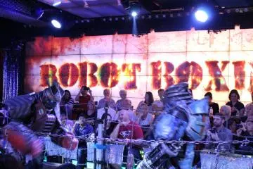<p>The robot boxing pits two large robots against each other with the crows cheering on their side. The winner robot may challenge an audience member so be prepared!</p>