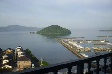 <p>The morning view from the hotel balcony of Omura Bay. A great start to a new day.</p>