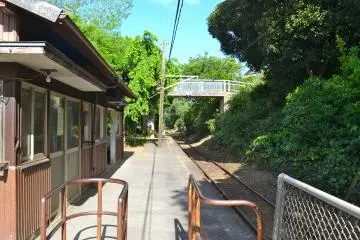 <p>A quiet platform with a single-track line</p>