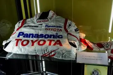 <p>Racing suit and gloves of a Formula 1 driver</p>