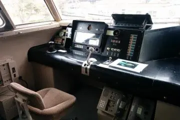<p>A view of the driver's seat in one of the bullet trains in the front lawn area</p>