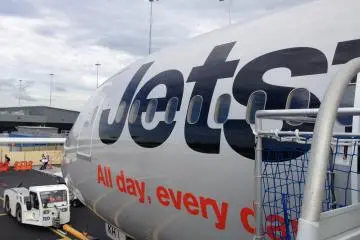 As Jetstar operates from low cost terminals in Tokyo and the Gold Coast, there is no air bridge service. Instead you need to climb some stairs to get to the aircraft.