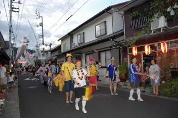 The Uchiko Town International Association lead the dancing procession in 2010 with a World Cup Soccer theme.