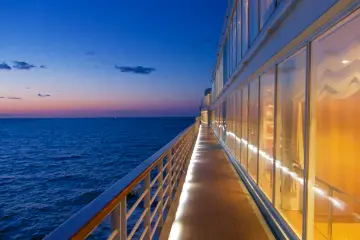 <p>Strolling the deck on a picturesque evening</p>