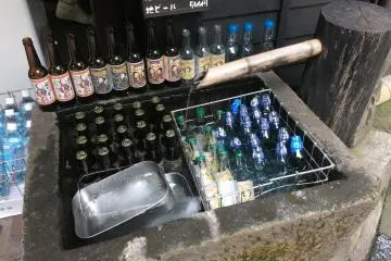 <p>Ramune chilled in a tray of natural spring water &amp; ice outside Goto's sake store.</p>
