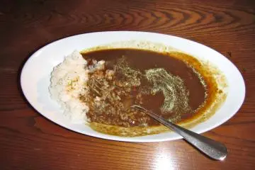 <p>A friend reported that this curry rice is actually spicy but not so much that one needs to reach for a glass of water</p>