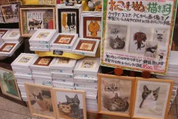 Different styles of cat art &nbsp; (Photo: Mary Wislowski)