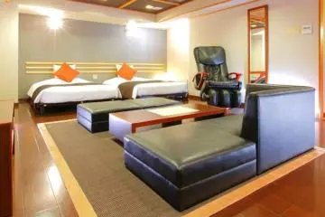 ห้องพัก Grand Deluxe Twin พร้อมเก้าอี้นวดตัว