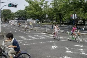 <p>Kids riding around the track complete with actual road signs and working traffic lights. Most of them follow the rules. Most.&nbsp;</p>