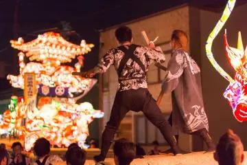 The floats parade through the crowds at the beginning of the festival