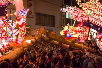 Two of the floats try to win by pushing each other back