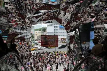 An escalator with mirrors gave a great opportunity for something special and eccentric