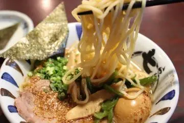 <p>Tasting the noodles</p>