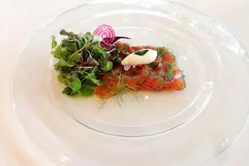 Marinated Sanuki Salmon with dill, Japanese pink pepper balls, lightly dressed micro leaf salad