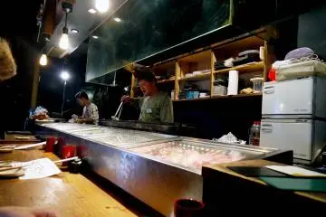 <p>Where the skewers are prepared and cooked&nbsp;</p>