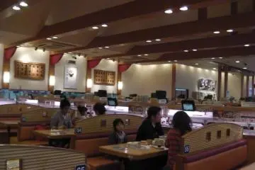 The typical interior of a kaiten-zushi&nbsp;restaurant - notice the conveyor-belt!