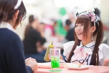 A maid serving a girl customer