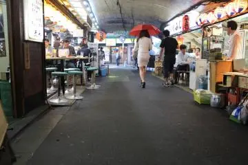 <p>The lady with a red umbrella is a great touch</p>