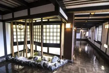 <p>Here, a mini Japanese stone garden adds to the experience of dining at Inanba.</p>