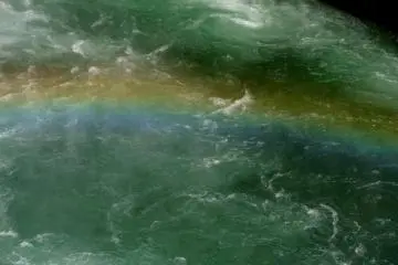 <p>A rainbow in the spray at the bottom</p>