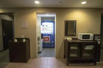 Vacuums, electronic stoves, pots, microwaves and an ice machine are available for use on every level. The vending machine is available every 4 floors.