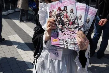 <p>Masked maid nice enough to let me photograph her</p>