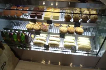<p>The mouth-watering food case shows a range of sweet and savory treats</p>