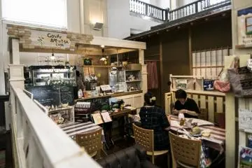 <p>Cafe CoVar in the main building. It really shouldn't be surprising to find ladies doing some handiwork while enjoying their refreshments.</p>