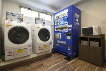 This laundry area is located on the 2nd floor. The laundry machines are coin operated.