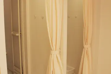 The three showers are at the bottom floor.