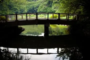 A bridge crossing from the Taiwanese pavilion to the traditional Japanese garden