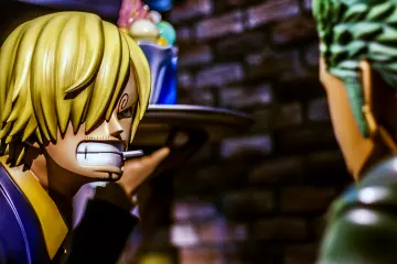 Sanji, always with food in the hand, seems to have some troubles to keep calm while arguing with Zoro... (Photo: © 尾田栄一郎/集英社・フジテレビ・東映アニメーション / © Eiichiro Oda/Shueisha, Toei Animation / © Amusequest Tokyo Tower LLP)