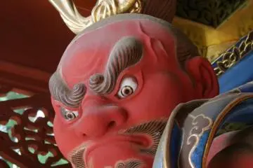 Statues like these guard the gates